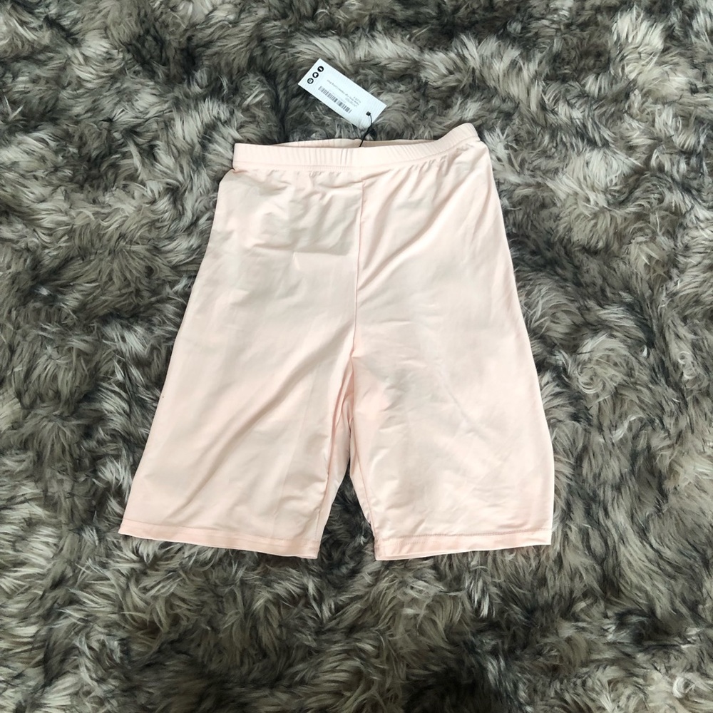 Pink shiny biker shorts